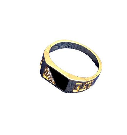 Gold tone and black ring accented with rhinestones