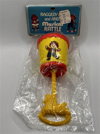 New Old Stock 1974 Bobbs-Merrill Co Raggedy Ann and Andy Yellow Musical Rattle