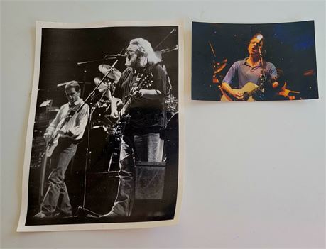(2) pictures of Jerry Garcia & band member in concert