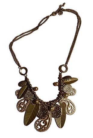 Goldtone leaf and scroll pendant necklace