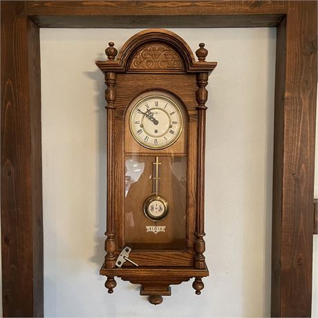 Howard Miller Wall Clock with Key