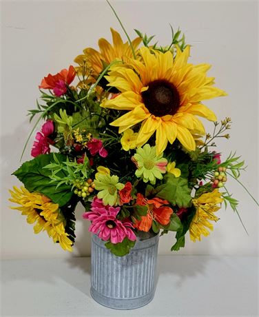 Bright Spring bouquet in metal container