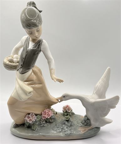 Lladro Girl Holding Basket of Goose Eggs Figurine