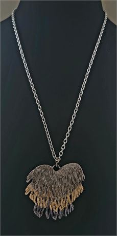 Multi layered hammered metal pendant necklace