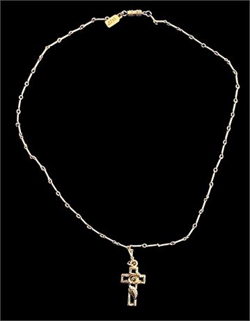 1928 Gold tone crucifix with flower accent