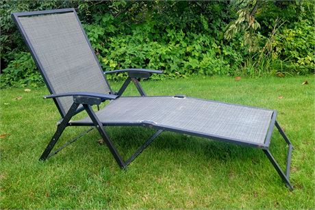 Folding reclining metal and mesh lounge chair