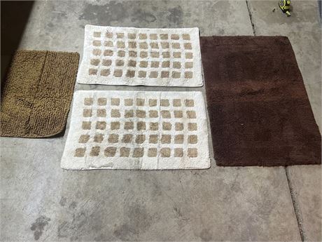 Neutral white and brown bath mats