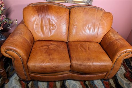 Rolled Arm Leather Loveseat with Hammered Head Nail Trim