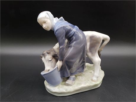 Royal Copenhagen Girl with Calf Figurine 779