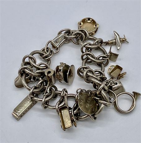 Silver Tone Charm Bracelet with Musical Instrument Charms