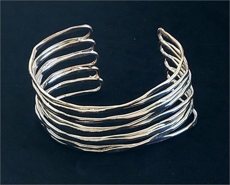 Striking silver tone cuff bracelet