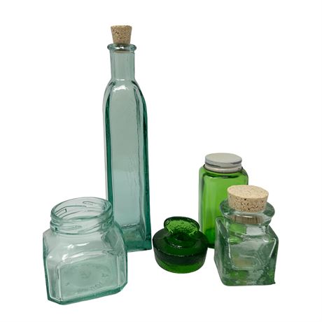 Lot of Green Glass Bottles Varying in Size