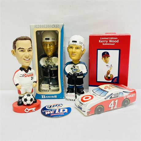 Mixed Sports Memorabilia Collection with Bobbleheads and More