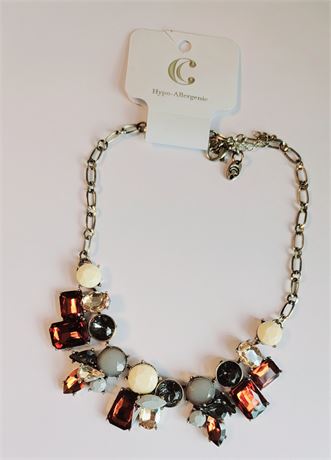 New on card signed beige amber tone necklace