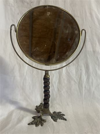 Vintage mirror with brass feet