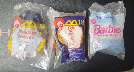 (3) sealed McDonald's Happy Meal Toys-Hercules,Bushy the Lion Beanie Baby,Barbie