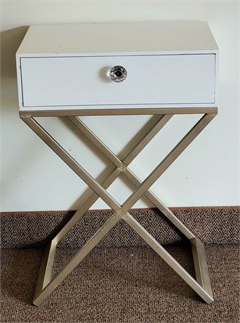 White nightstand with drawer and gold legs