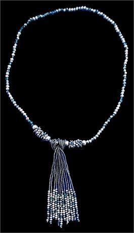 Intricate seed bead braid and fringe necklace