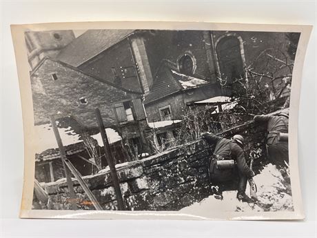1940 WW2 Press Wire Photo German Soldiers take cover behind stone wall