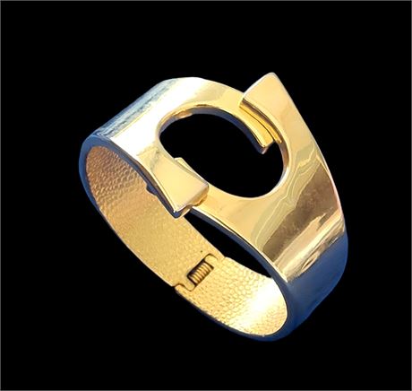 Statement Gold tone hinged cuff bracelet